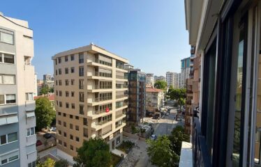 4+1 LUXURY APARTMENT FOR SALE IN CADDEBOSTAN WITH PARTIAL SEA VIEW