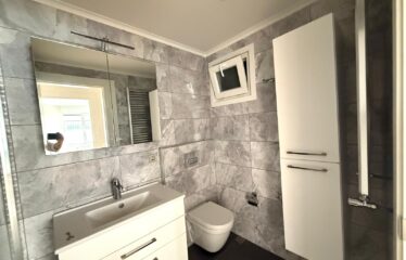 4+1 LUXURY APARTMENT FOR SALE IN CADDEBOSTAN WITH PARTIAL SEA VIEW